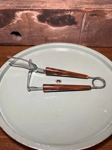 Vintage 50's Marbled Bakelite Handles Meat Serving Fork Pusher Spring Action - Picture 1 of 7