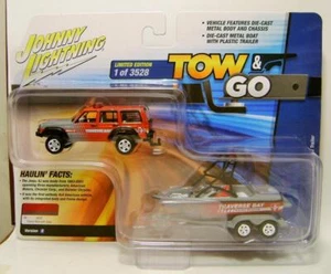 JEEP CHEROKEE XJ V/B W/ BOAT AND TRAILER TOW & GO JOHNNY LIGHTNING 2023 - Picture 1 of 4