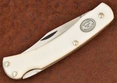 FACA SODBUSTER MOORE MAKER MATADOR TEXAS FEITA NOS EUA BRANCA LOCKBACK (28271) - Imagem 1 de 4