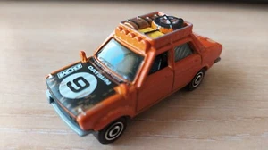 MATCHBOX - 1970 DATSUN 510 RALLY CAR NUMBER 9 LOOSE 1/64 APROX *NEW* - Picture 1 of 7