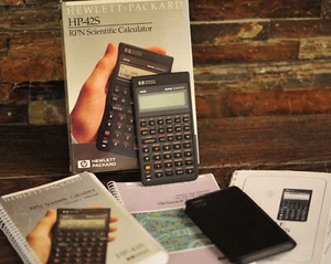 Hewlett Packard HP 42S RPN Scientific Calculator with Owner's Manual Box Extras - Picture 1 of 20