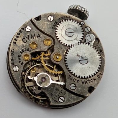 Movimiento Reloj Bolsillo Cyma Tacy Watch Co. 23.5mm - 6 Joyas Balance Gira Foto 1 de 4
