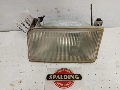 *FADED* Driver Left Headlight from 1993 Ford F250 10908746 - Image 1 of 4