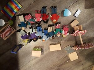 12 Dolls House dolls  and Bedroom + Garden  furniture and fridge 