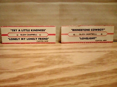 Two Glen Campbell Jukebox Title Strips Rhinestone Cowboy / Try a Little Kindness - Image 1 of 3