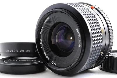 Minolta Nuevo MD 28mm F2.8 MF Gran Angular Lente Prime con Capucha TOP COMO... - Imagen 1 de 4