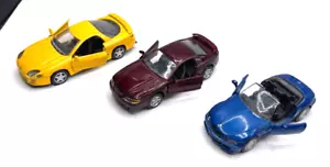 Lot (3) 1/32 New Ray Pull Back Die-Cast Orange 3000GT, Mustang, BMW Z3 - Picture 1 of 12