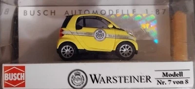 BUSCH 46111 SMART Fortwo Coupé 07 "Warsteiner" - scala H0 - Immagine 1 di 4