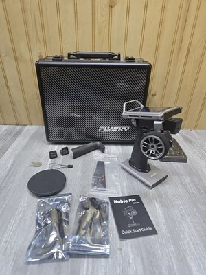 Rádio de controle remoto Flysky NB4+ PRO 18 canais com 2 receptores sem fio FGr4B+Fs V2  - Imagem 1 de 4