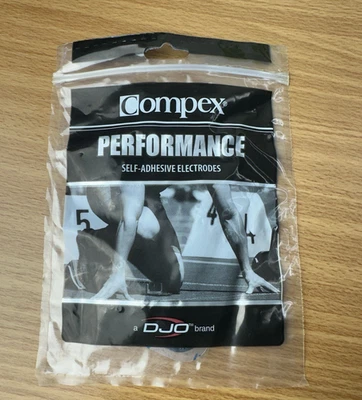Electrodos a Presión Doble Compex Negro 2"x4" Rendimiento 1 Paquete (2 Electrodos) Foto 1 de 2