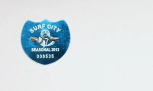 2012 SURF CITY LBI NEW JERSEY SEASONAL BEACH BADGE / TAG WITH PIN - Picture 1 of 1