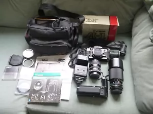 Canon A-1 35mm SLR Film Camera, 2 Lens, Motor Drive, Flashgun, Shoulder Bag, VGC - Picture 1 of 24