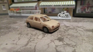 Praline 1:87 H0 5602 B Citroen AX tetto apribile marrone chiaro NUOVO IMBALLO ORIGINALE - Foto 1 di 5