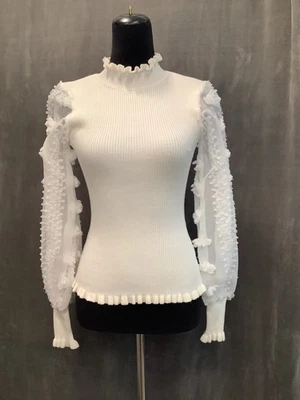 Suéter tejido manga larga puff transparente marfil casi famoso XS Foto 1 de 4