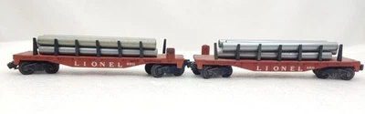 2 Lionel Train Postwar 6511 Flat Cars W/5 Pipes Each W/ Diecast Truck Plates C-8 - Image 1 of 4