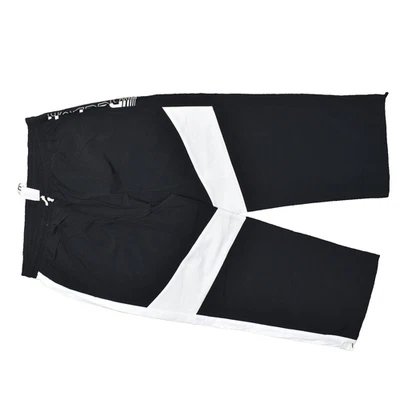 NOVA Calça Reebok Feminina Plus Size 2X Quebra-Vento Perna Larga Preta Nylon Drawstr - Imagem 1 de 4