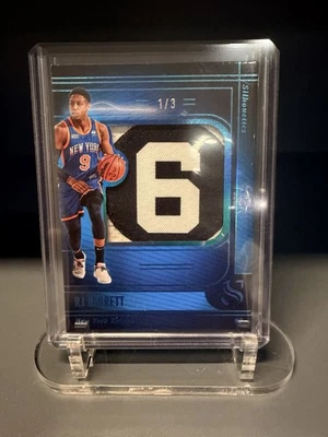 2024-25 Panini Silhouette RJ Barrett "6" Bill Russell Tribute Patch 1/3 Case Hit - Image 1 of 2