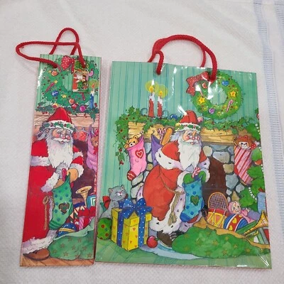 Bolsa de regalo de papel navideño vintage de Papá Noel asas de cuerda  Foto 1 de 4