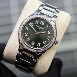 Patek Philippe 24 7300/1200A-011 Green Dial 2023 Unworn - Picture 1 of 9