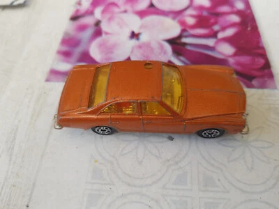 K-37 corgi juniors: Buick Regal braun, Leuchte vorhanden (im Fahrzeug) - Bild 1 von 4