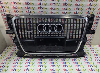 09-12 REJILLA SUPERIOR DELANTERA AUDI Q5 CON MOLDURA CROMADA OEM NEGRA LY9B DAÑADA Foto 1 de 4