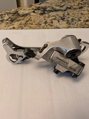 Shimano Alivio 8SIS RD-MC18 Rear Derailleur: 7 / 8 Speed - Silver - SGS - Image 1 of 4