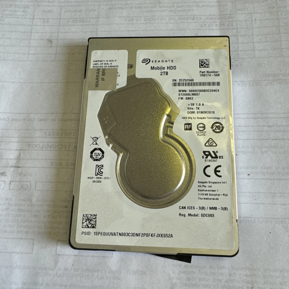 Seagate Mobile ST2000LM007 2TB 2.5" SATA 6Gb/s Laptop HDD 7mm OEM 1R8174-568 - Image 1 of 1