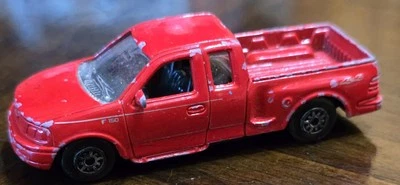 Welly 1:60 Scale 1999 Red Ford F150 Supercab Flareside Loose Pickup Truck Model  - Image 1 of 4
