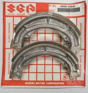 64400-02830 SUZUKI OEM REAR BRAKE SHOES 1989-2004 QUAD RUNNER LT-F160,LT160E - Picture 1 of 5