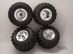TAMIYA METALLIC MIDNIGHT PUMPKIN / UNIMOG WHEELIE 4 CHROME RIM AND TIRE COMBO - Picture 1 of 1