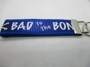 Llavero Bad To The Bone con cinta fuerte de correas - Elige el color - Imagen 1 de 6
