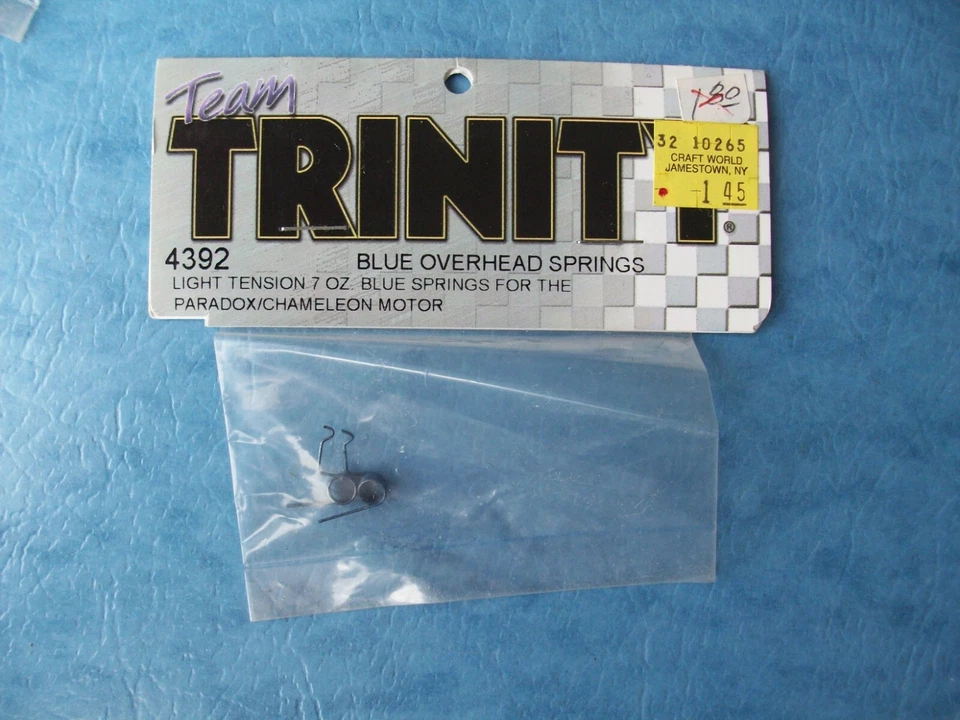 TRINITY 4392 BRUSHED MOTOR SPRINGS LIGHT BLUE 7 OZ PARADOX CHAMELEON TRK4392 NIP - Image 1 of 1