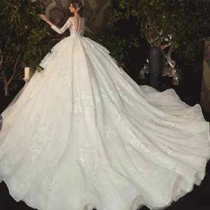 Vestido de novia manga larga con cuentas perlas apliques ilusión botones - Imagen 1 de 10