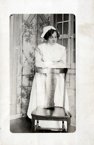 Vintage early 1900's RPPC Postcard "Nurse (Miss Raven) & chair-great shot" Cyko
