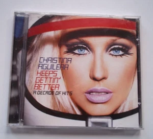 CD CHRISTINA AGUILERA KEEPS GETTIN' BETTER A Decade Of Hits GENIE IN BOTTLE 2008 - Picture 1 of 4