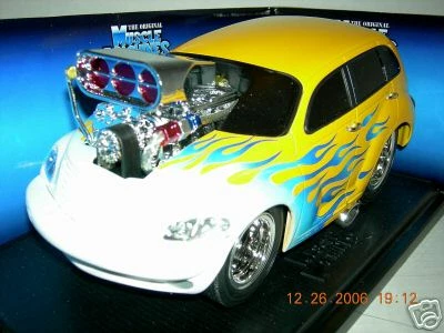 2000 P T CRUISER YELLOW  W/ FLAMES  MUSCLE MACHINE 1:18 - Image 1 of 3