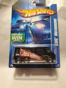 Autocaravana Hot Wheels Racing GMC 2006 negra con llamas W8 - Imagen 1 de 10