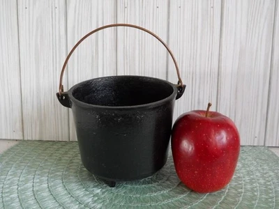 Vintage Small Cast Iron Cauldron Pot with 3 Feet and Handle 4.25" Tall - Image 1 of 4
