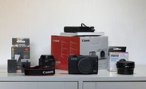 Canon M200 + EF-M 15-45 + 2 batterie originali + Adattatore EF S-EF M + tracolla - Foto 1 di 20