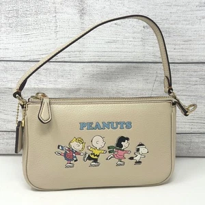 Cartera Coach X Peanuts Nolita 19 con motivo Snoopy And Friends marfil multi CE858 - Imagen 1 de 9