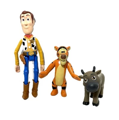 Lote de juguetes Disney - Toy Story Sheriff Woody, Frozen Sven y Winnie the Pooh Tigger Foto 1 de 4