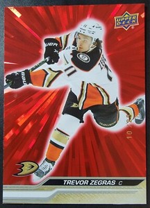 2023-24 Upper Deck Hockey Series 1 Trevor Zegras Red Outburst 11/25 #1 Ducks