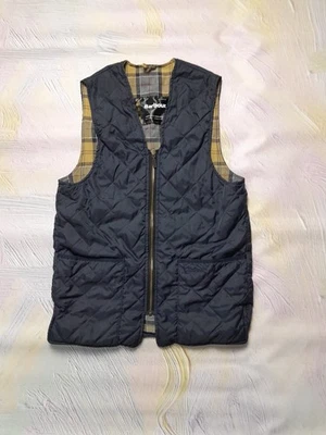 Chaleco de campo acolchado clásico azul oscuro Barbour para hombre forro con cremallera Foto 1 de 4