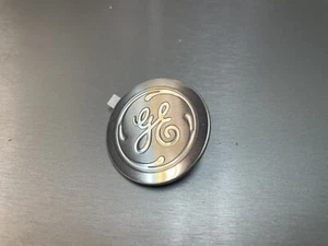 GE Badge Nameplate WR02X35066 1.50"DIAx 0.46" Thick, SS Finish with backer, New - Picture 1 of 2