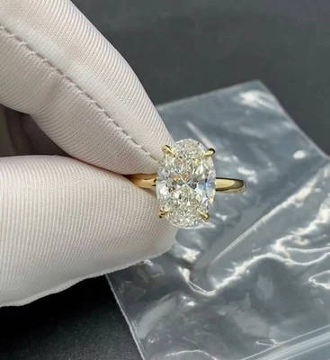 Anillo de boda nupcial de diamantes cultivados en laboratorio con certificación IGI ovalado de 5,00 quilates de oro amarillo de 14 quilates Foto 1 de 4