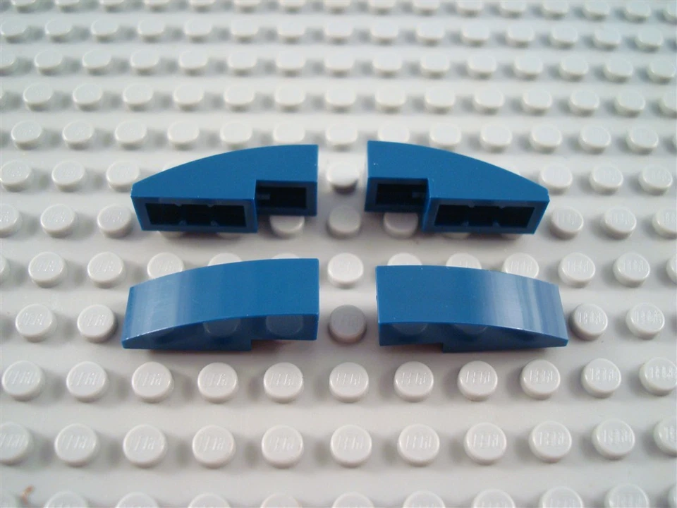 New LEGO Lot of 4 Dark Blue 3x1 Curved Slopes - Image 1 of 1