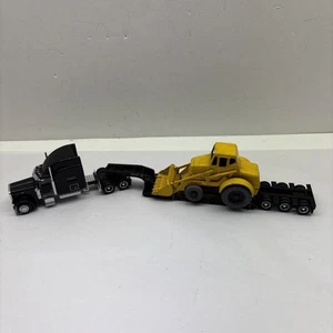 Norscot 1/87 Peterbilt 389 con Lowboy llevando una pala hidráulica Weathrill de los años 50’s - Imagen 1 de 9