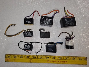 25DD00 LOT OF 8 CAPACITORS, 250VAC CLASS, 14 ELEMENTS, 1.5MF - 6MF RANGE, VGC - Picture 1 of 9