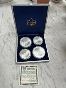 COFANETTO 4 MONETE FIOR DI CONIO ARGENTO 1976 MONTRÉAL XXI OLYMPIADE CANADA - Picture 1 of 9