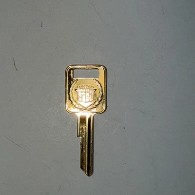 OEM Key Blank For Cadillac Allante Gold Crest C Ignition 1987-93 Plus 3 cut keys - Image 1 of 4